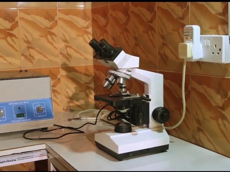 Laboratory microscope and incubators